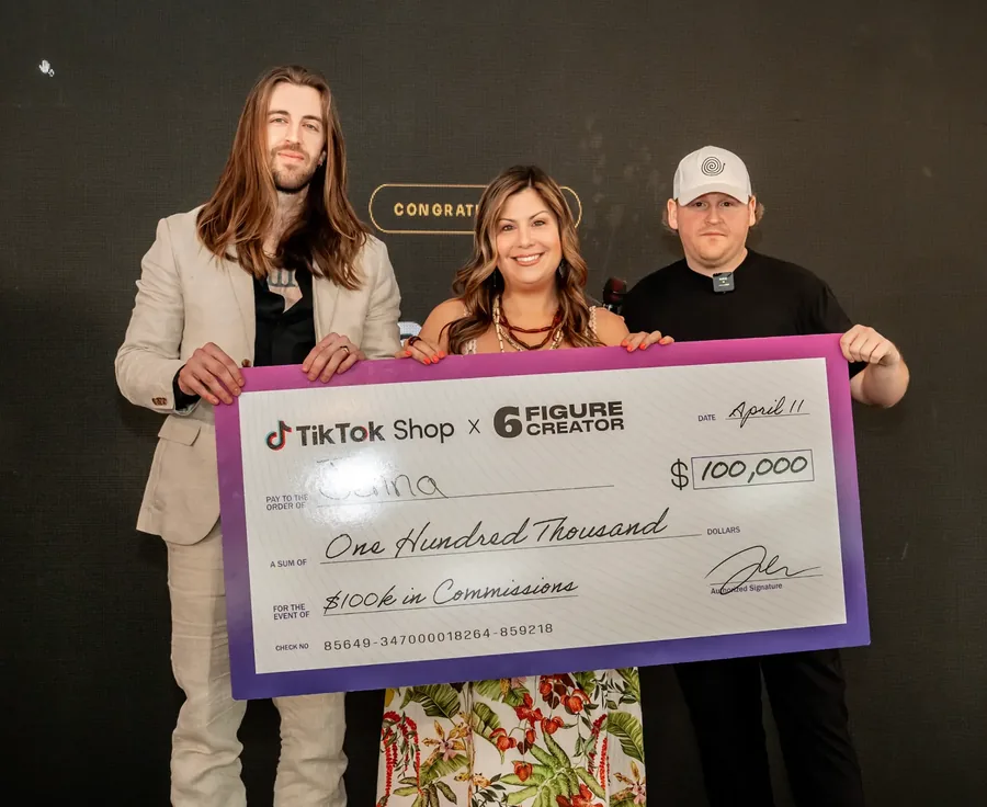 A 6FC member presented with a $100,000 TikTok Shop commission check